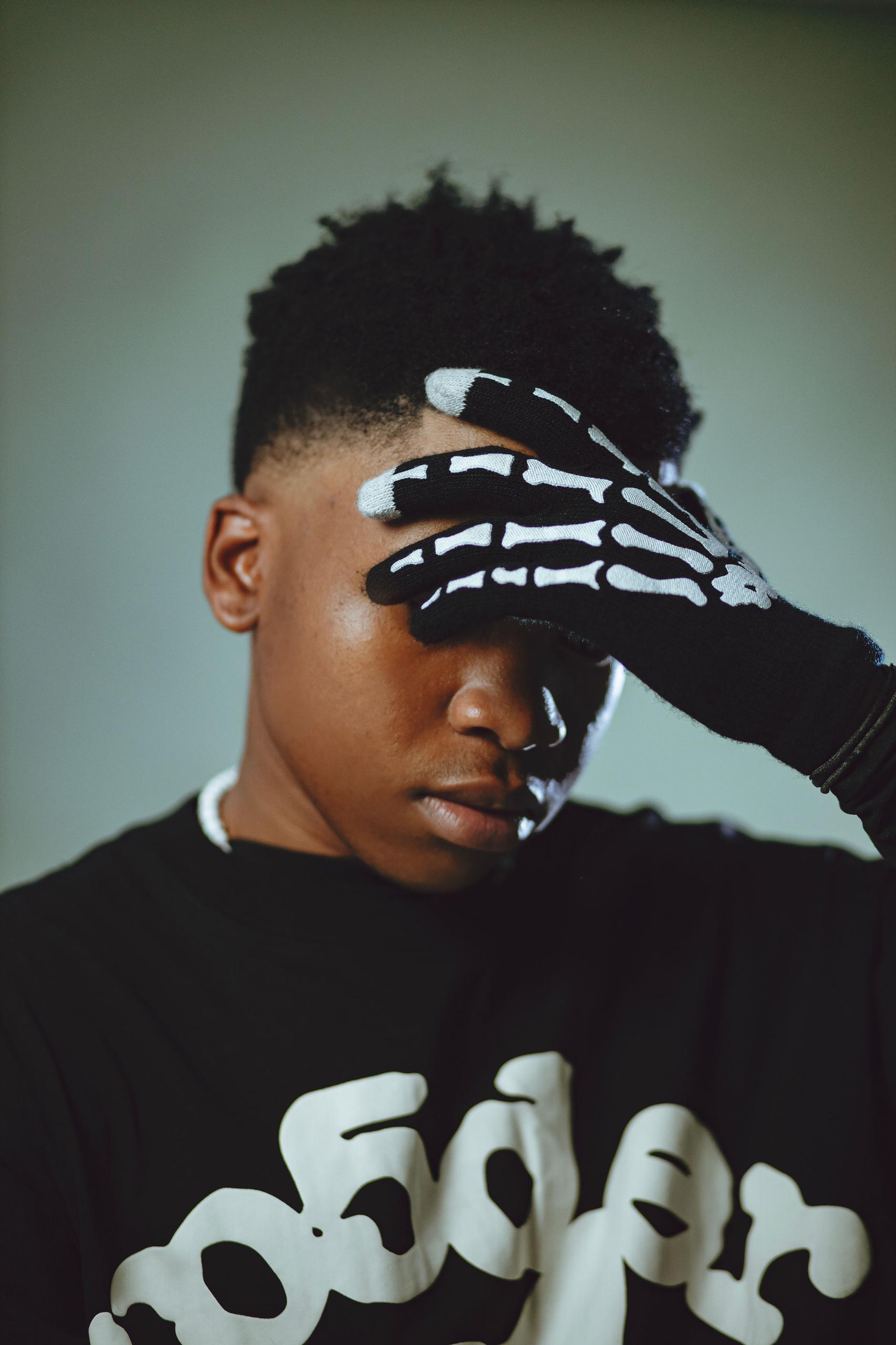 Sane.wav with hand covering face
